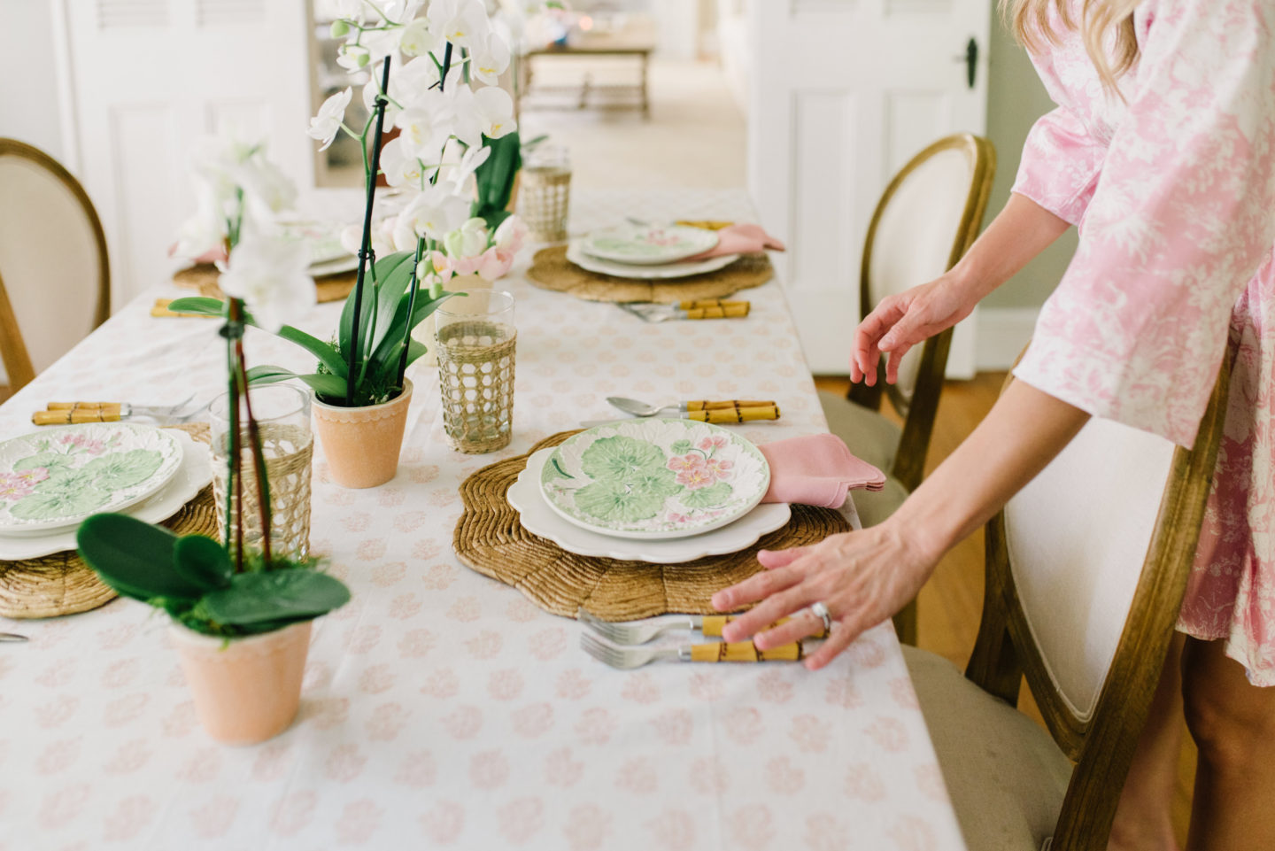 Pink and green feminine tablescape orchid tulips publix