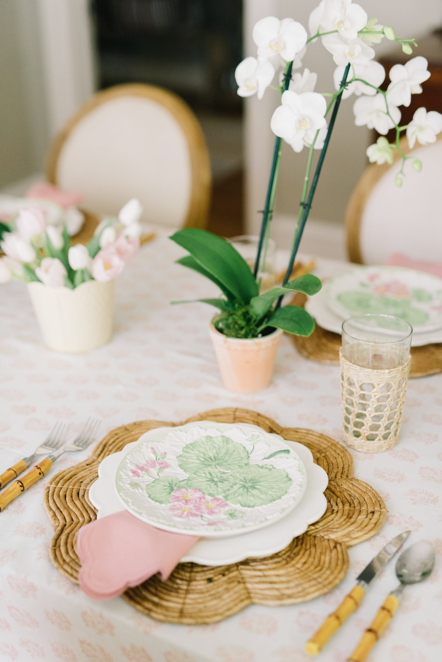 Pink and green feminine tablescape orchid tulips publix